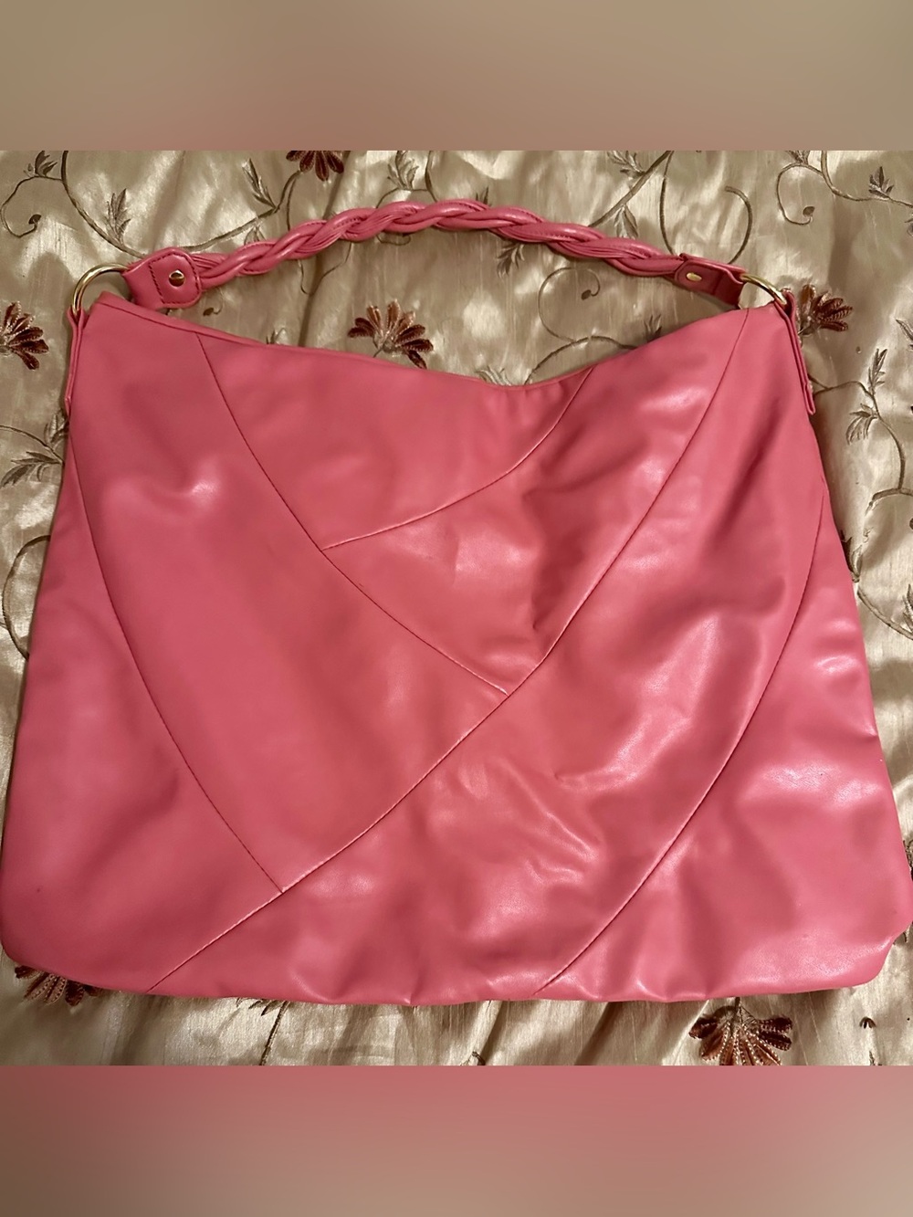 Stylish Pink Braided-Handle Shoulder Bag peeling shown in picture